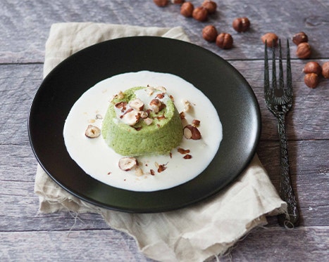 Flan di broccoli con burrata e nocciole